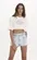 T-SHIRT COM DETALHE MUSCLE E TUNEL NA BARRA DIMY TSH83450