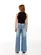 CALÇA JEANS WIDE LEG COM BOLSINHA POCHETE LAÇO BOLSOS DESFIADA LULUZINHA 020571124